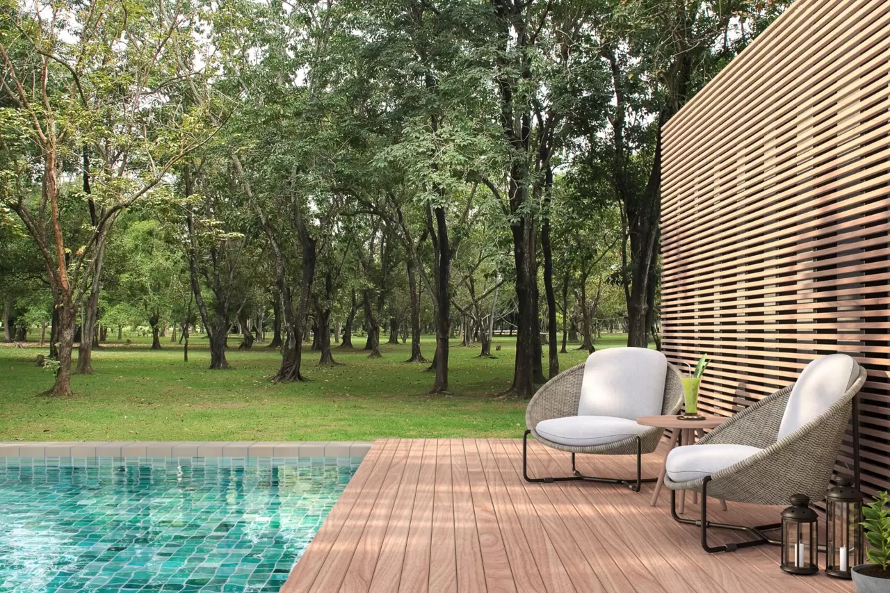 Poolside deck with outdoor lounge setting